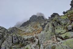 Outcroppings obscured in dense mist